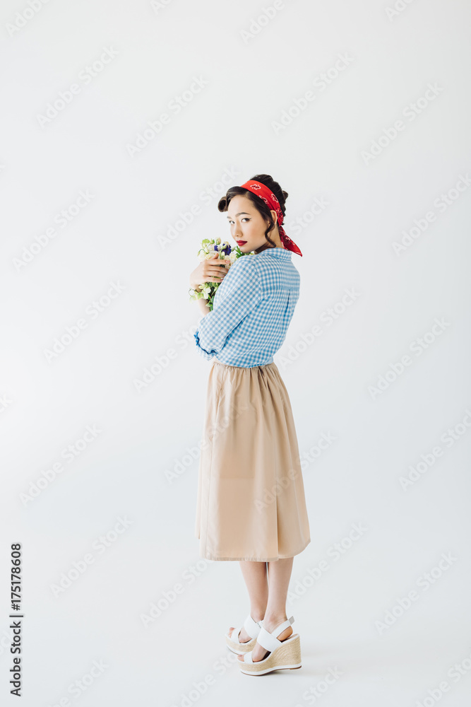 asian woman with bouquet of flowers
