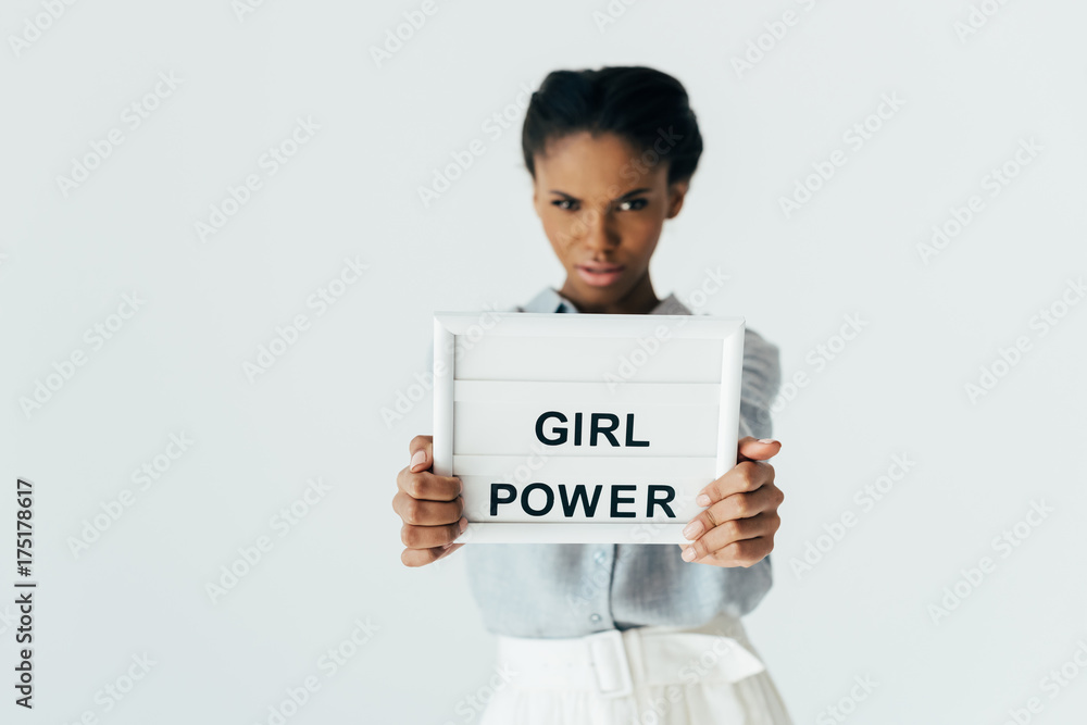 african american woman with girl power board african american woman with girl power board