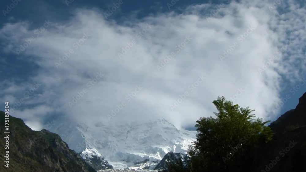 Cloud Over Snow Covered Moutain Top Behind Trees - Static Cloud Over Snow Covered Moutain Top Behind Trees - Static