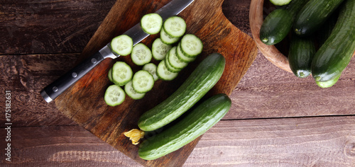 Fresh and sliced cucumbers. Sliced cucumbers on a cutting board. cucumbers for diet and healthy eating
