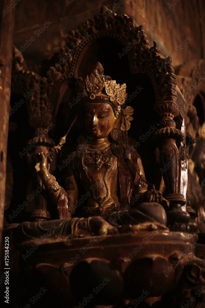 Fototapeta premium Buddhist statues in the temple tuibet