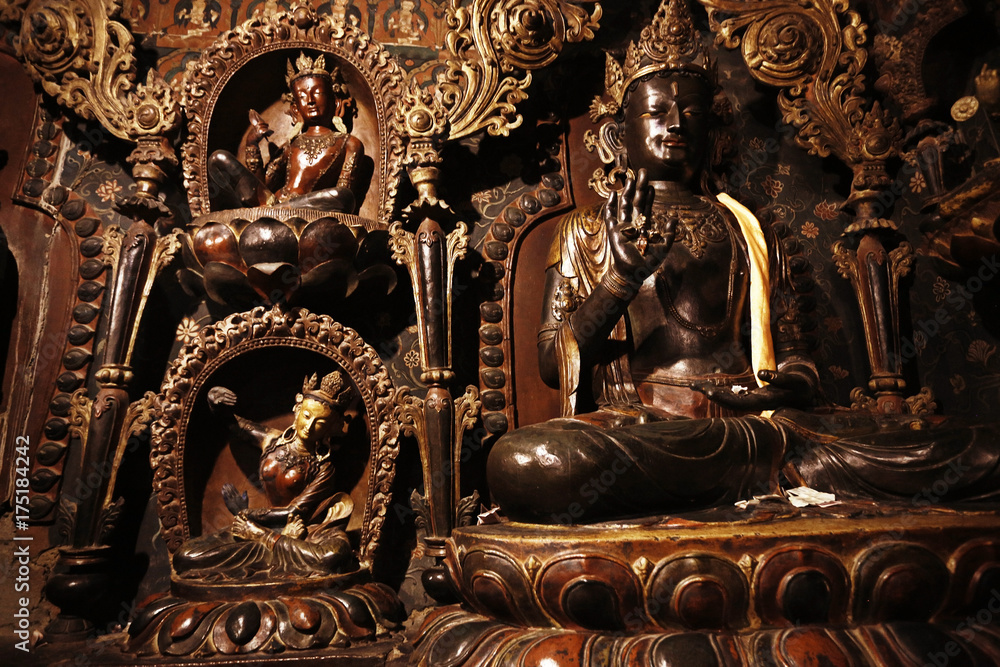 Buddhist religious symbols inscriptions in Tibet old runes Stock Photo ...