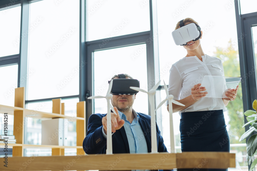 Nice hard working colleagues testing new technologies Nice hard working colleagues testing new technologies