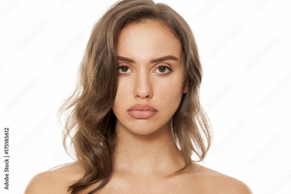 Portrait of beautiful young woman on white background Portrait of beautiful young woman on white background