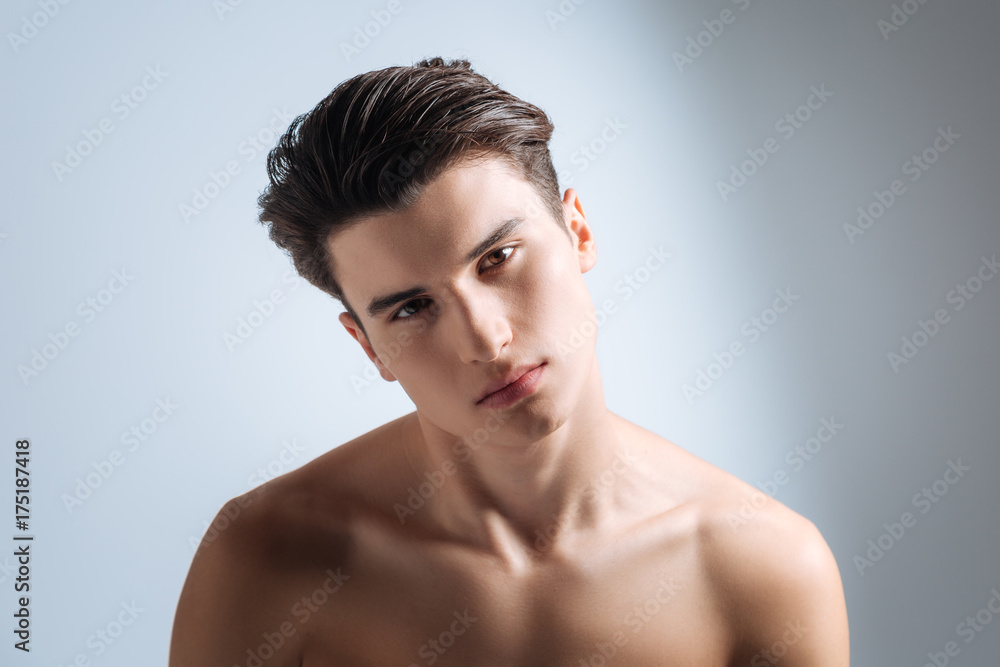 Delighted male person posing on camera Delighted male person posing on camera