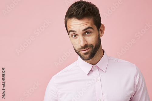 Good looking guy in pink shirt, portrait