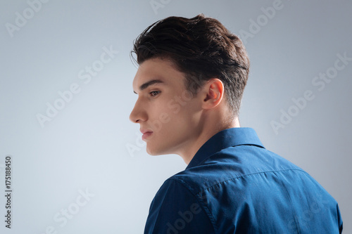 Thoughtful male model looking sideways