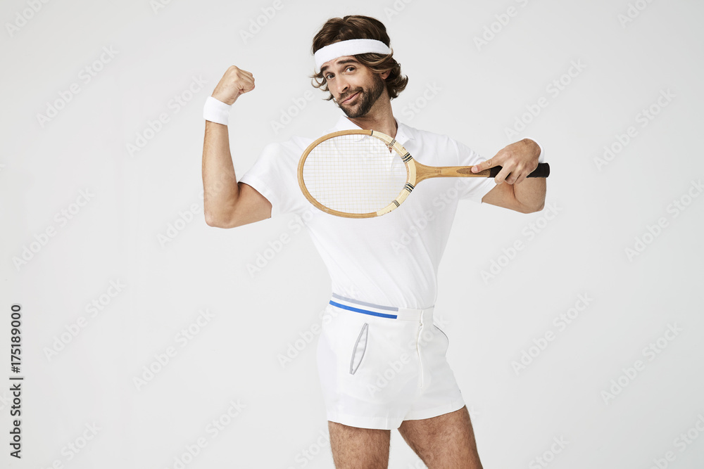 Funny tennis dude flexing muscle with racket, portrait Stock Photo | Adobe  Stock