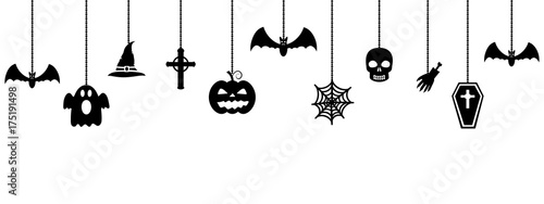 Halloween ornaments hanging on white background