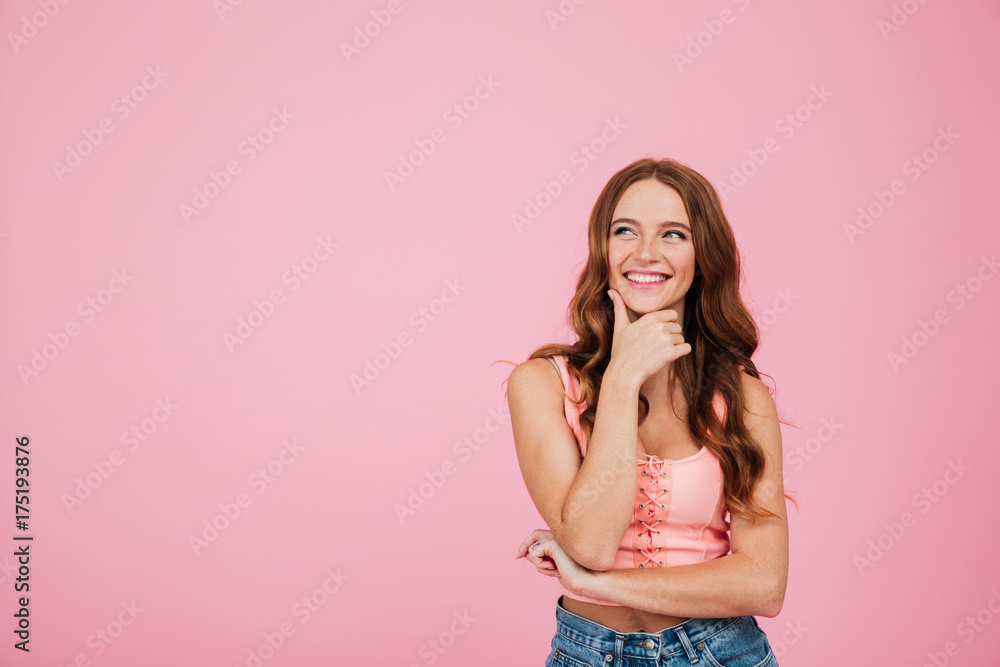 Portrait of a smiling woman in summer clothes looking away Portrait of a smiling woman in summer clothes looking away