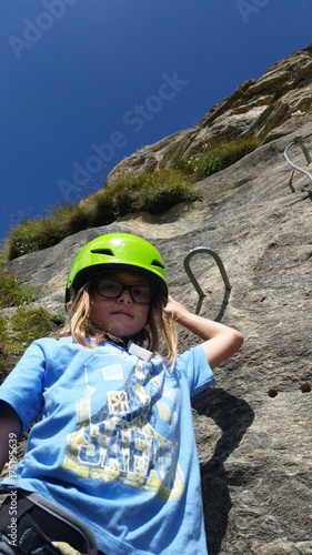 Young girl - children climbing on via ferrata