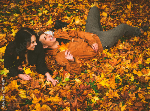 Lovely couple in autumn park