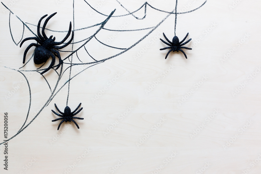 Fototapeta premium Tło wakacje Halloween z pająkami i sieci web