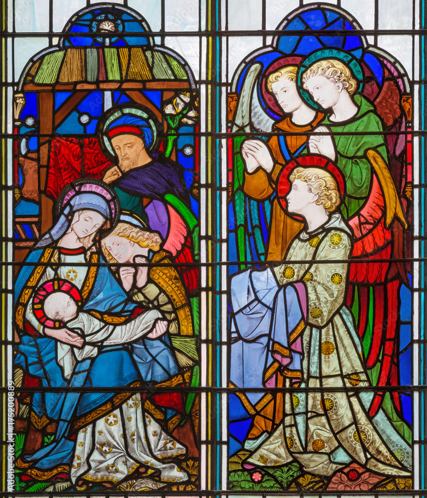LONDON, GREAT BRITAIN - SEPTEMBER 14, 2017: The Nativity of Jesus Christ on the stained glass in the church St. Michael Cornhill by Clayton and Bell from 19. cent.