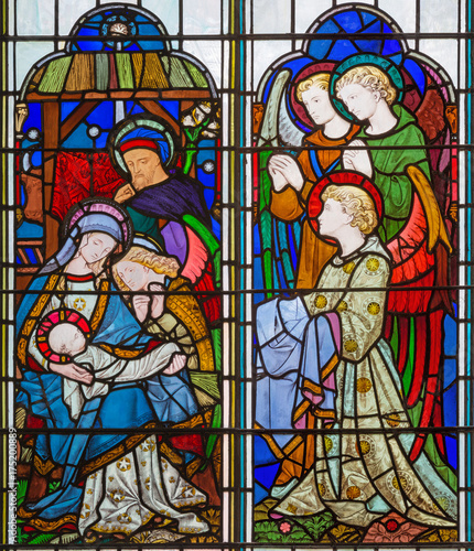 LONDON, GREAT BRITAIN - SEPTEMBER 14, 2017: The Nativity of Jesus Christ on the stained glass in the church St. Michael Cornhill by Clayton and Bell from 19. cent. photo