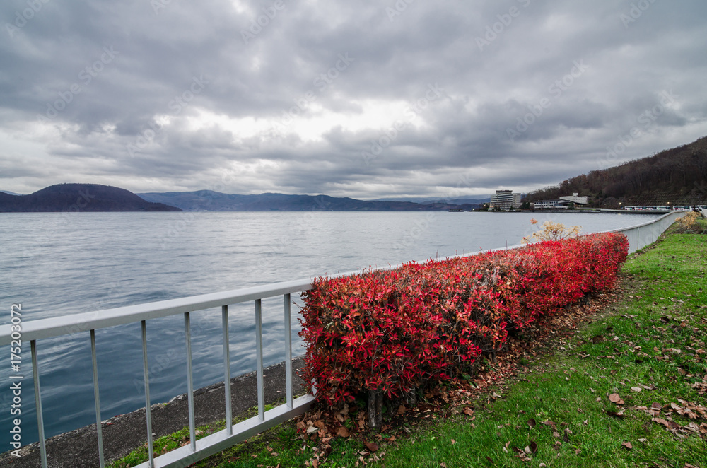 Cloudy view of the famous Lake Toya. The lake is a volcanic caldera lake in Shikotsu-Toya National Park, located in Hokkaidō, Japan. The area also famous for its natural hot spring and active volcano.