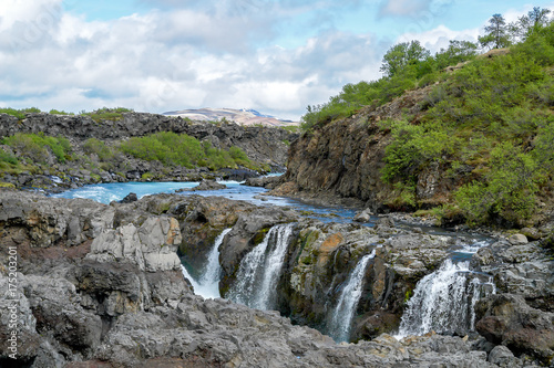 Barnafoss waterfall - Western Iceland. Water flows near Barnafoss waterfall  called also  Waterfall of the children 