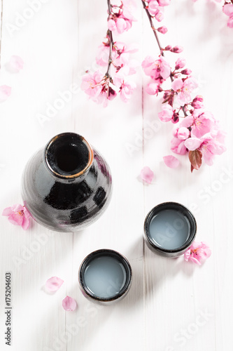 Tasty and strong sake with blooming flowers