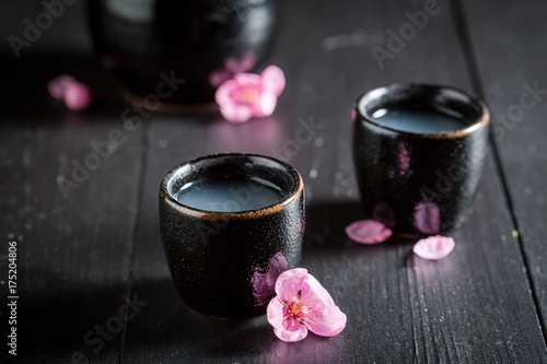 Delicious and good sake with blooming flowers