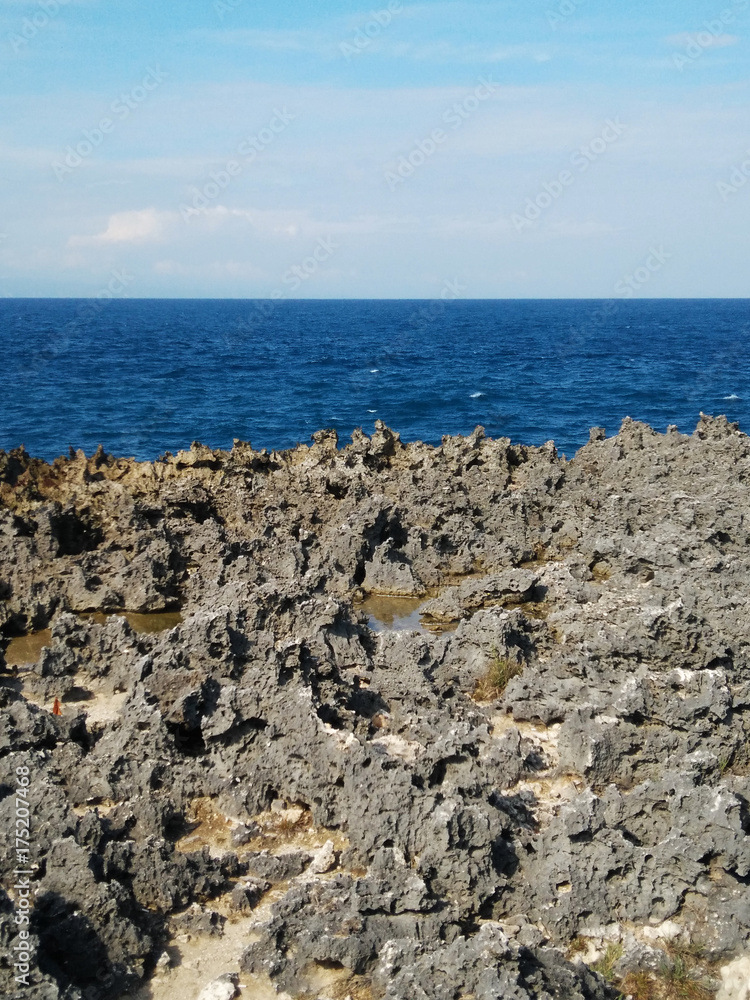 Sea horizon, rocks and sky Sea horizon, rocks and sky
