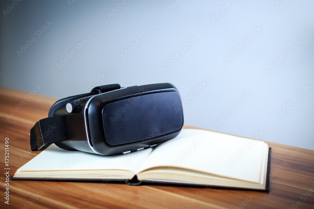 VR glasses lying on a notebook VR glasses lying on a notebook