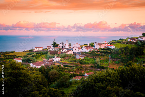 Beautiful pink stunning sunrise in a village in Nordeste, Sao Miguel Island, Azores, Portugal © Evgeni