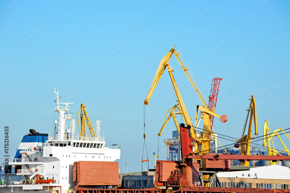 Bulk cargo ship under port crane Bulk cargo ship under port crane