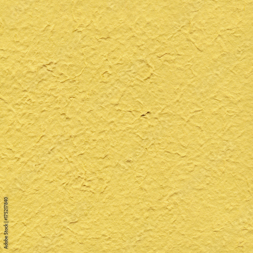 Yellow handmade paper background with pattern