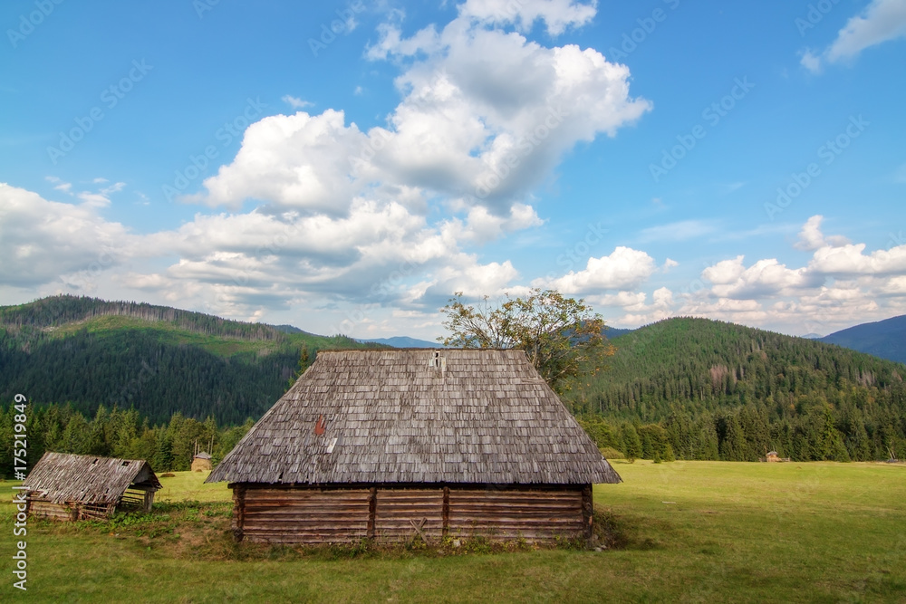 In the mountains of the Carpathians village Synevir abandoned wooden house. Without tenants. In the mountains of the Carpathians village Synevir abandoned wooden house. Without tenants.