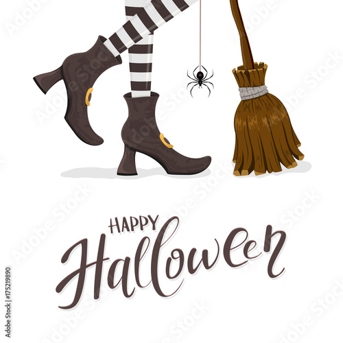 Text Happy Halloween with witches legs and broom