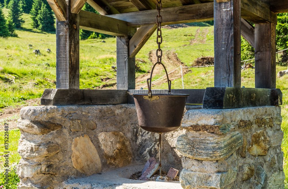 pot of polenta. Mountain symbol and South Tyrolean tradition. South Tyrol, Trentino Alto Adige, Bolzano, northern Italy pot of polenta. Mountain symbol and South Tyrolean tradition. South Tyrol, Trentino Alto Adige, Bolzano, northern Italy