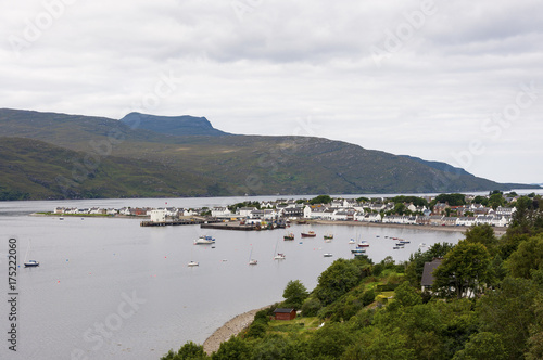Ullapool, Scotland - August 15, 2010: View of the fishing port and the village of Ullapool in the Highlands in Scotland, United Kingdom