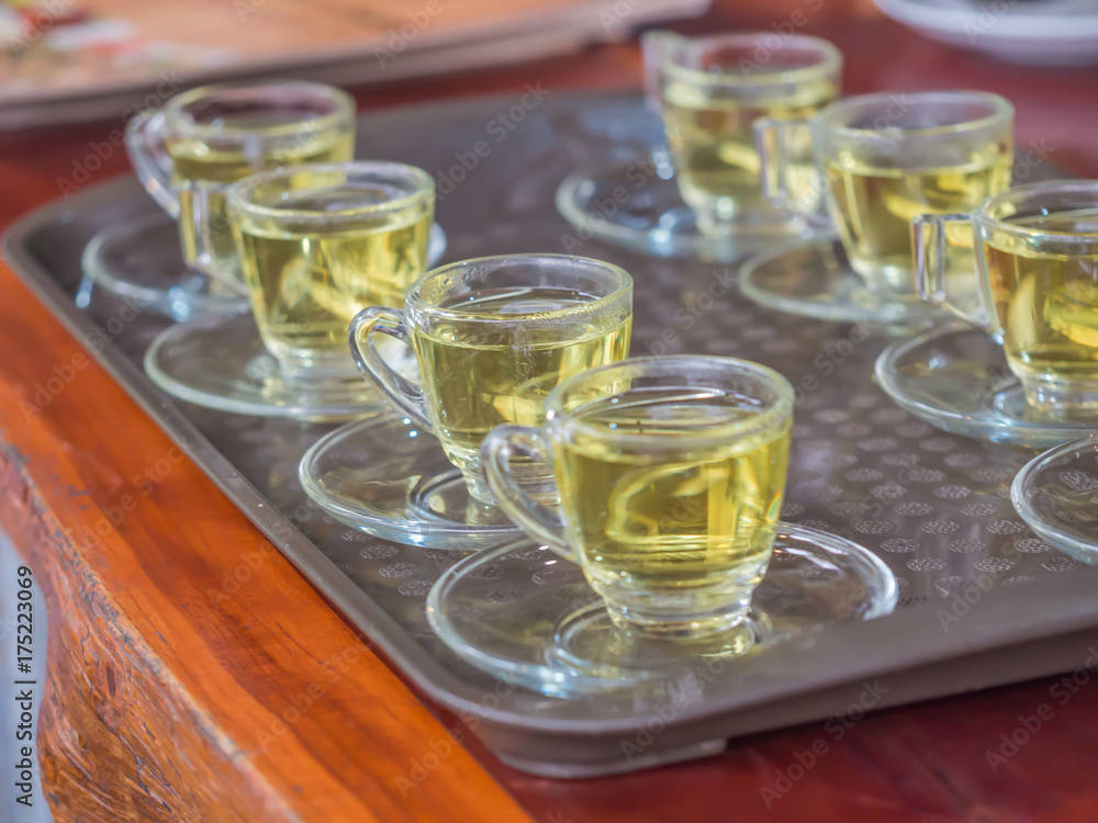 Preparing glasses of tea for serving customer. Preparing glasses of tea for serving customer.