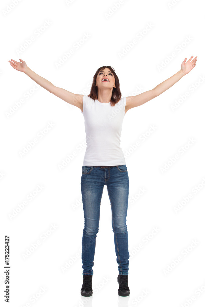 Happy Woman With Arms Outstretched Is Looking Up Happy Woman With Arms Outstretched Is Looking Up