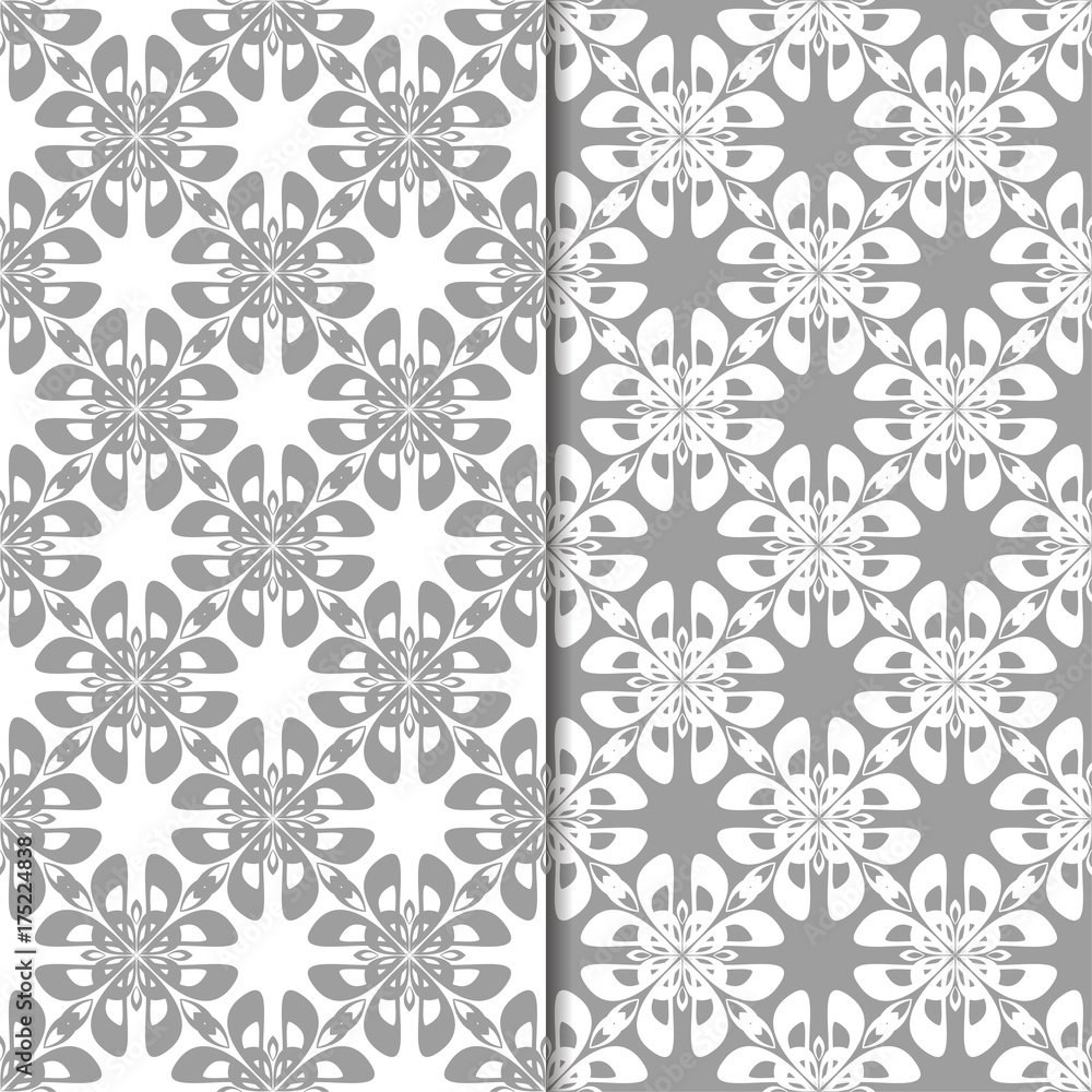 White and gray floral backgrounds. Set of seamless patterns White and gray floral backgrounds. Set of seamless patterns