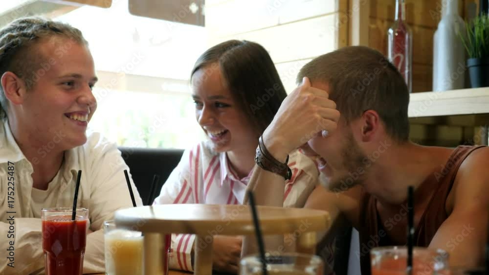 Friends enjoying together in the restaurant. Friends enjoying together in the restaurant.