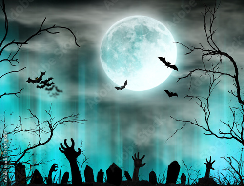 Spooky Halloween background with zombie hands.