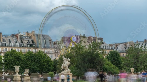Ferris wheel Roue de Paris on Tuileries Garden timelapse. Paris, France. photo