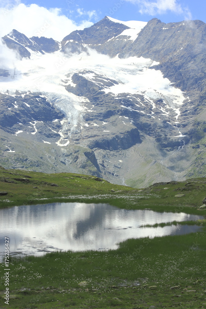 Fourcla Minor, 
Blick über Bergsee zum Piz Cambrena