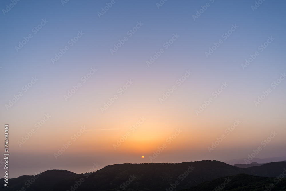 View of sunset with clear sky from Mount Inasa (Nagasaki, Japan) View of sunset with clear sky from Mount Inasa (Nagasaki, Japan)