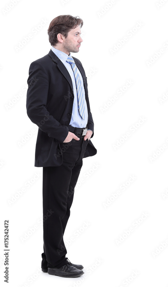 in full growth. side view.portrait of a serious business person. in full growth. side view.portrait of a serious business person.