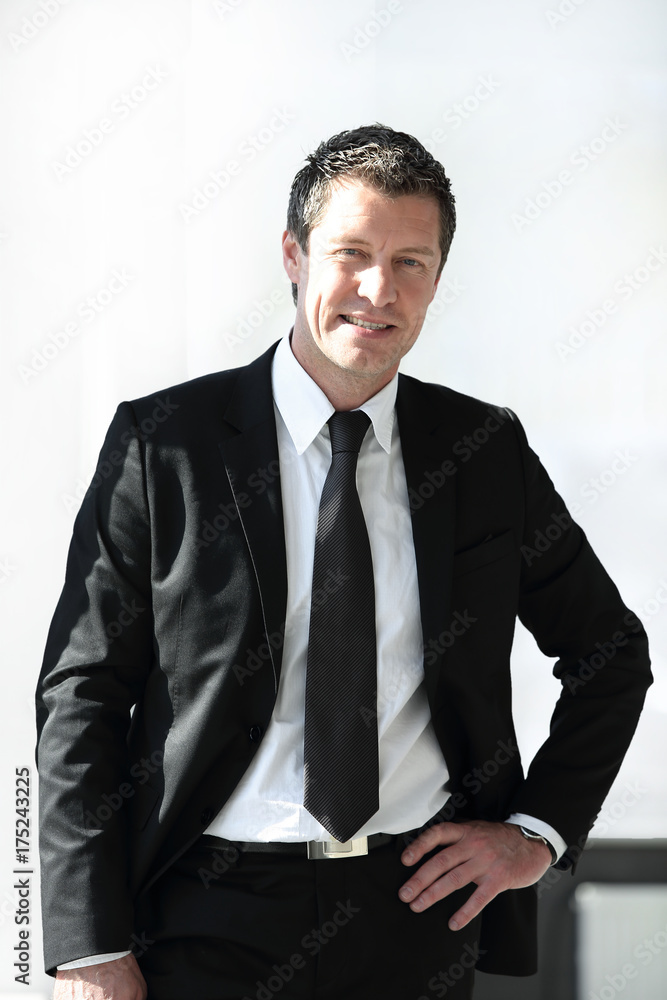 portrait of confident businessman on blurred background portrait of confident businessman on blurred background