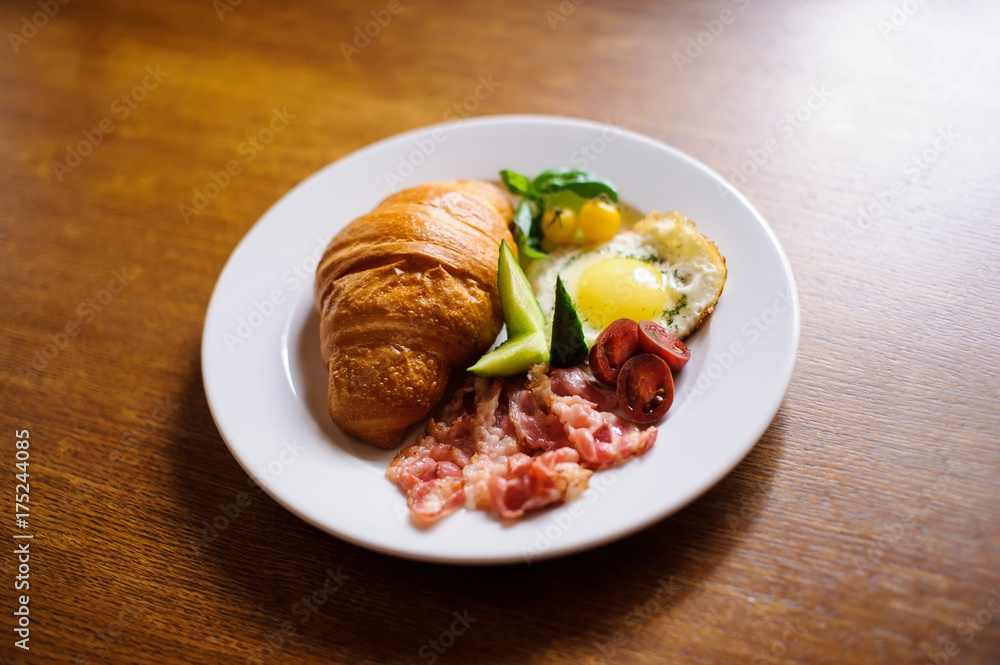 Fresh croissant with ham and salad Fresh croissant with ham and salad