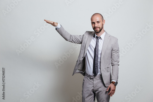 Stylish brutal manager, shot in studio, business coach, white background