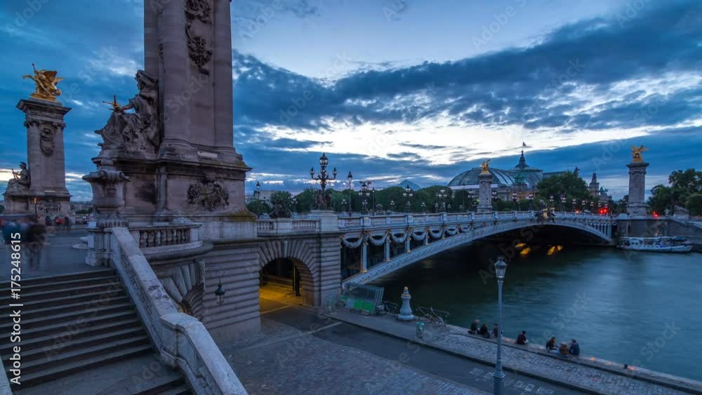 Alexandre Bridge in Paris at night in illumination day to night timelapse. Paris, France
