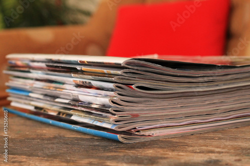 Magazines on the wooden table © Ellica