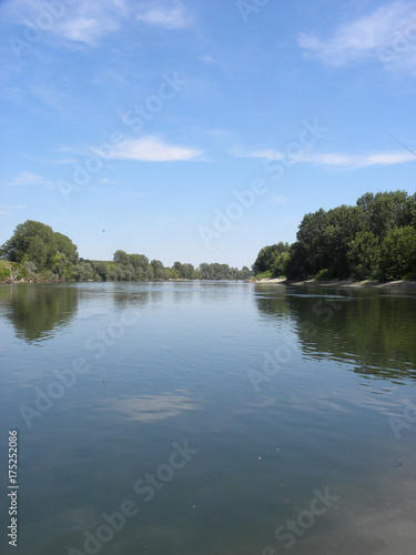 ITALY – JUNE 16, 2017: fluvial landscape at the confluence of Ticino and Po rivers, a few kilometres downstream (along the Ticino) from the city of Pavia, Lombardy. Northern Italy.