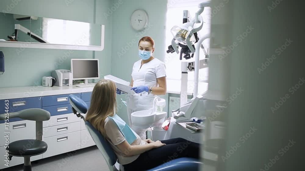 Health and Dental Care, Woman at Work as Dentist and Doctor, Meeting with Assistant and Talking with Young Female Patient in Professional Laboratory. Health and Dental Care, Woman at Work as Dentist and Doctor, Meeting with Assistant and Talking with Young Female Patient in Professional Laboratory.