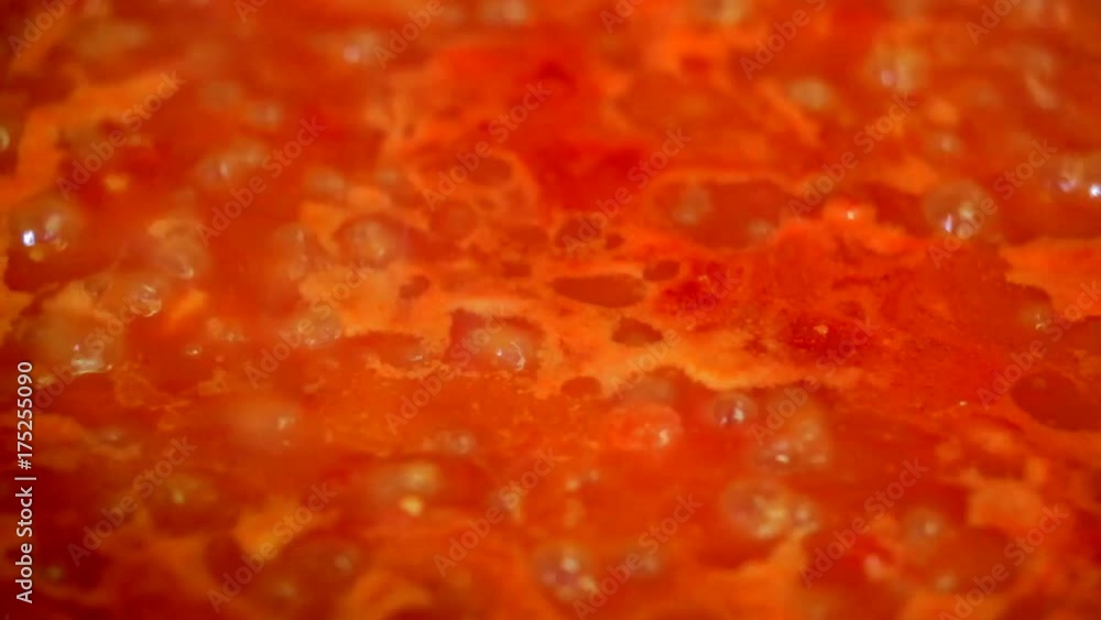 Cooking delicious tomato sauce closeup Cooking delicious tomato sauce closeup