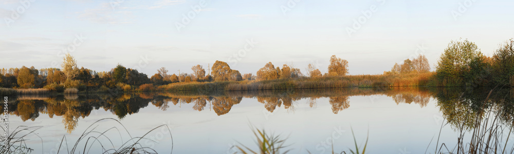 Autumn lake. Reflection. Russian nature.